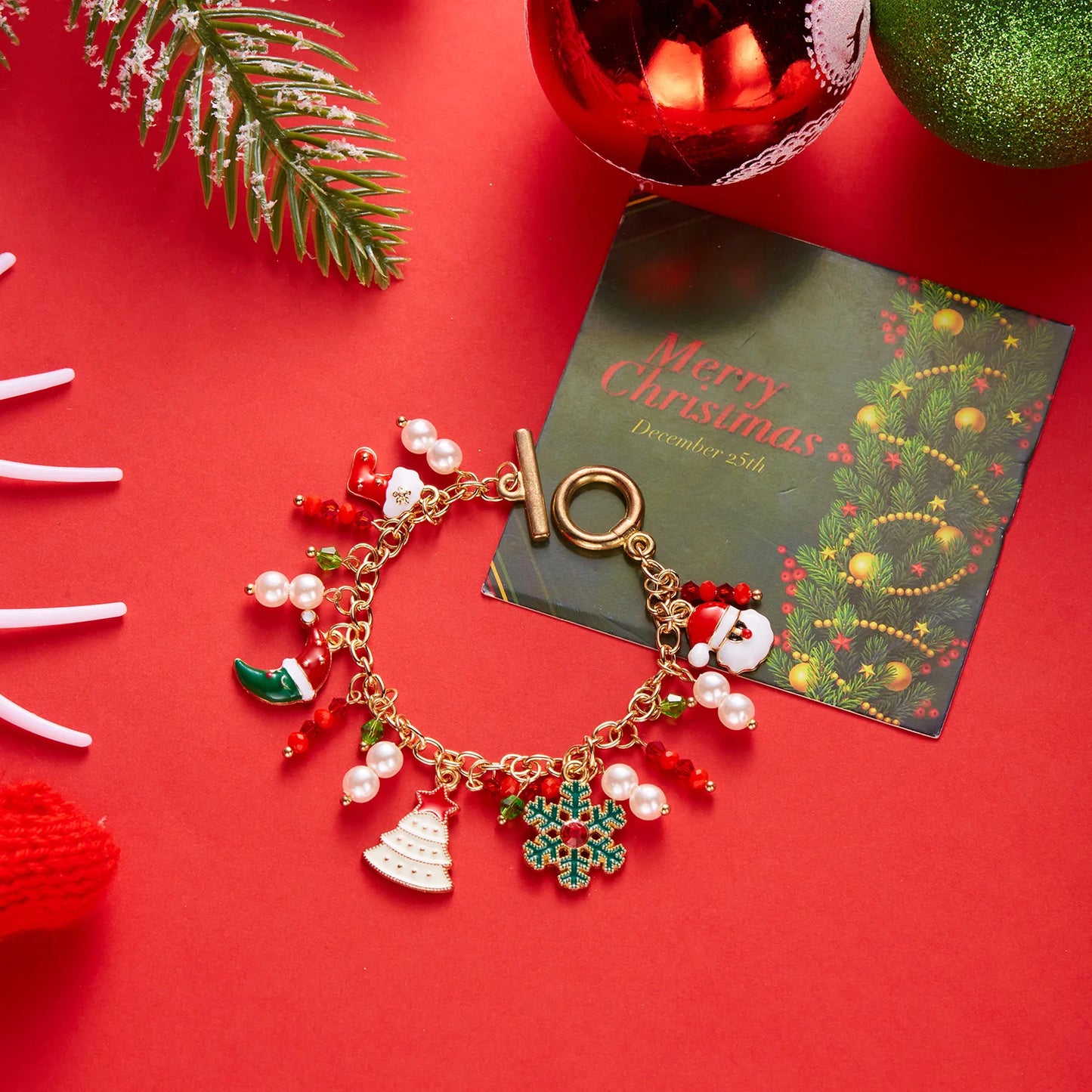 Kerst armband met metalen schakels, kerstman, sneeuwvlok en parels
