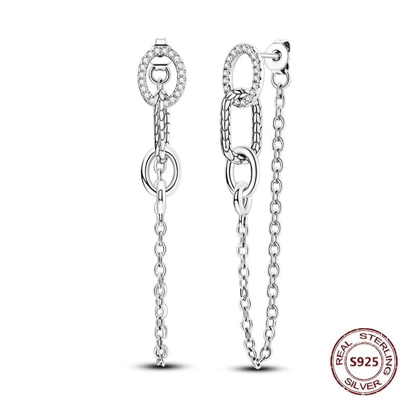 Zilveren oorbellen met lange ketting en geometrisch kruis design