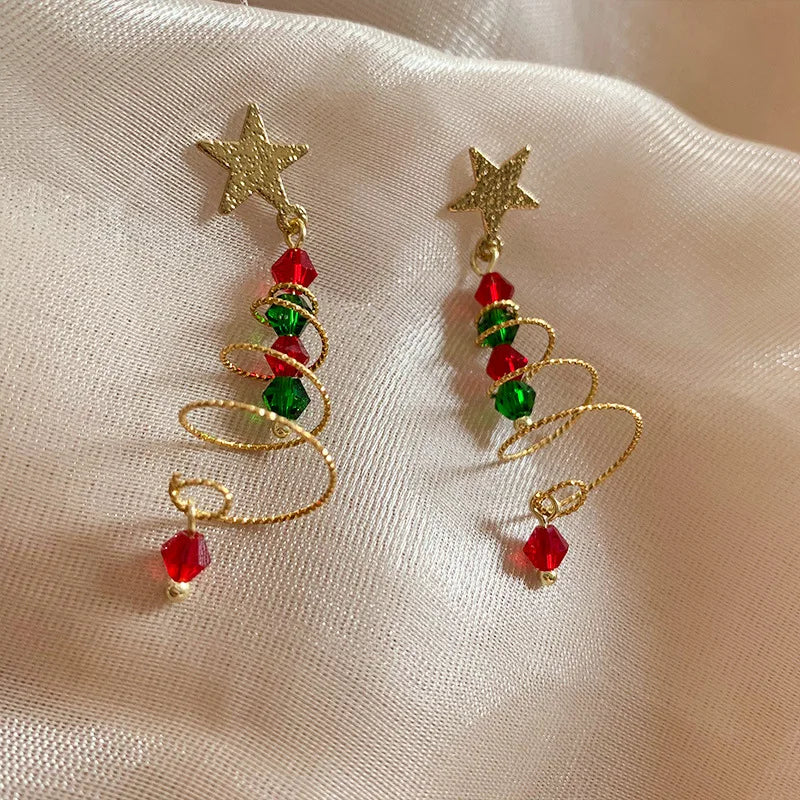 Kerst oorbellen groene strik met bel en rendier hanger – feestelijke damesoorbellen