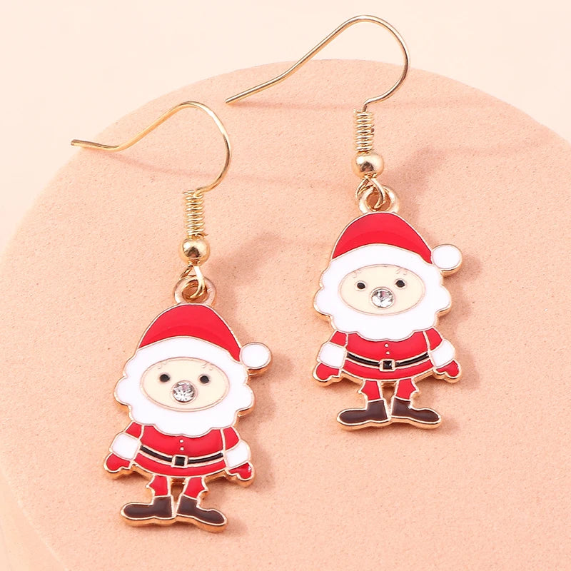 Kerst oorbellen met kerstman, rendier en sneeuwpop hangers