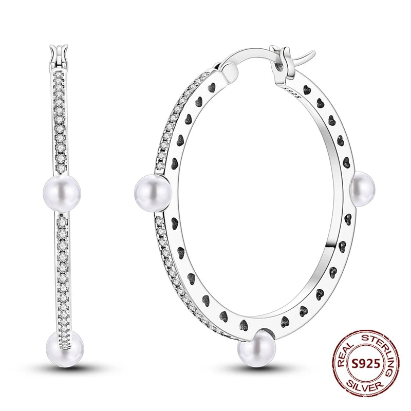 Zilveren oorbellen met vintage cirkel en witte zirconia