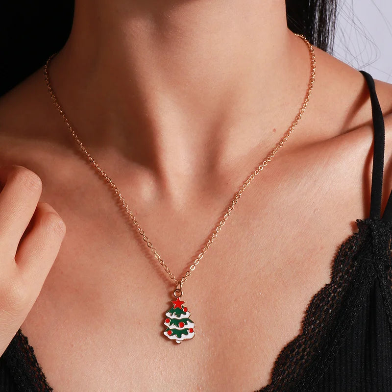 Kerst ketting met kerstboom, kerstman en belletjes hanger – feestelijke sieraden voor dames