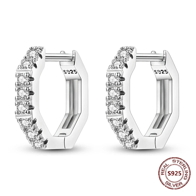 Zilveren oorbellen grote ronde hoops met zirkonia en vloeiend design