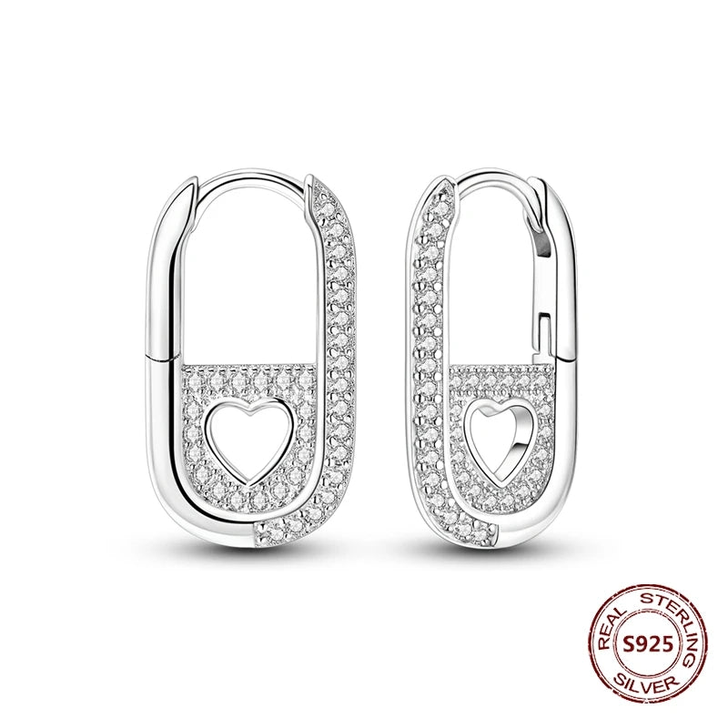 Zilveren oorbellen grote ronde hoops met zirkonia en vloeiend design