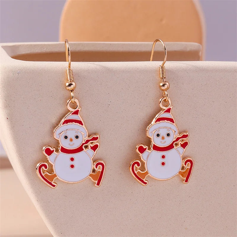 Kerst oorbellen met kerstman, rendier en sneeuwpop hangers