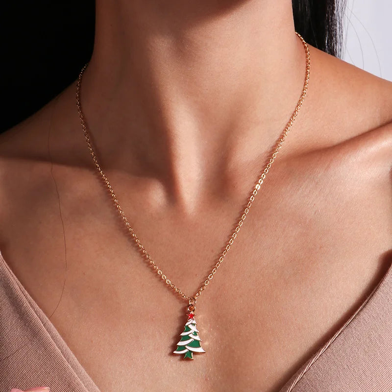 Kerst ketting met kerstboom, kerstman en belletjes hanger – feestelijke sieraden voor dames