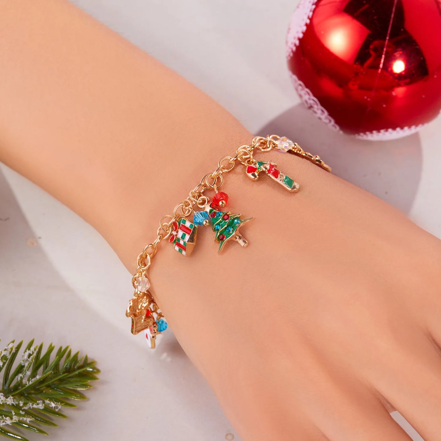 Kerst armband met metalen schakels, kerstman, sneeuwvlok en parels