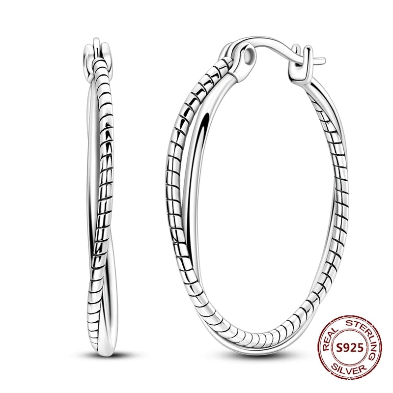Zilveren oorbellen met vintage cirkel en witte zirconia