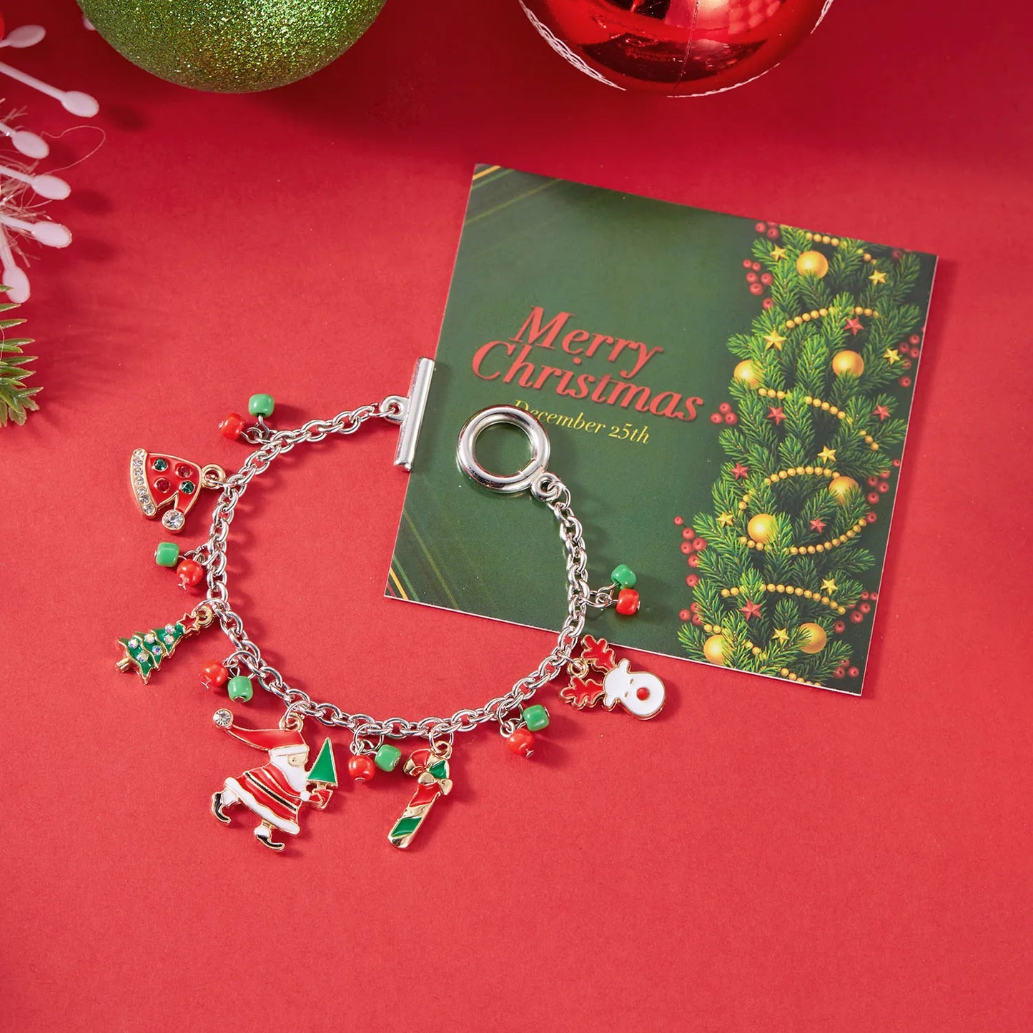 Kerst armband met metalen schakels, kerstman, sneeuwvlok en parels