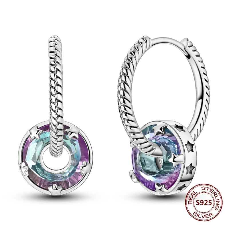Zilveren oorbellen grote ronde hoops met zirkonia en vloeiend design