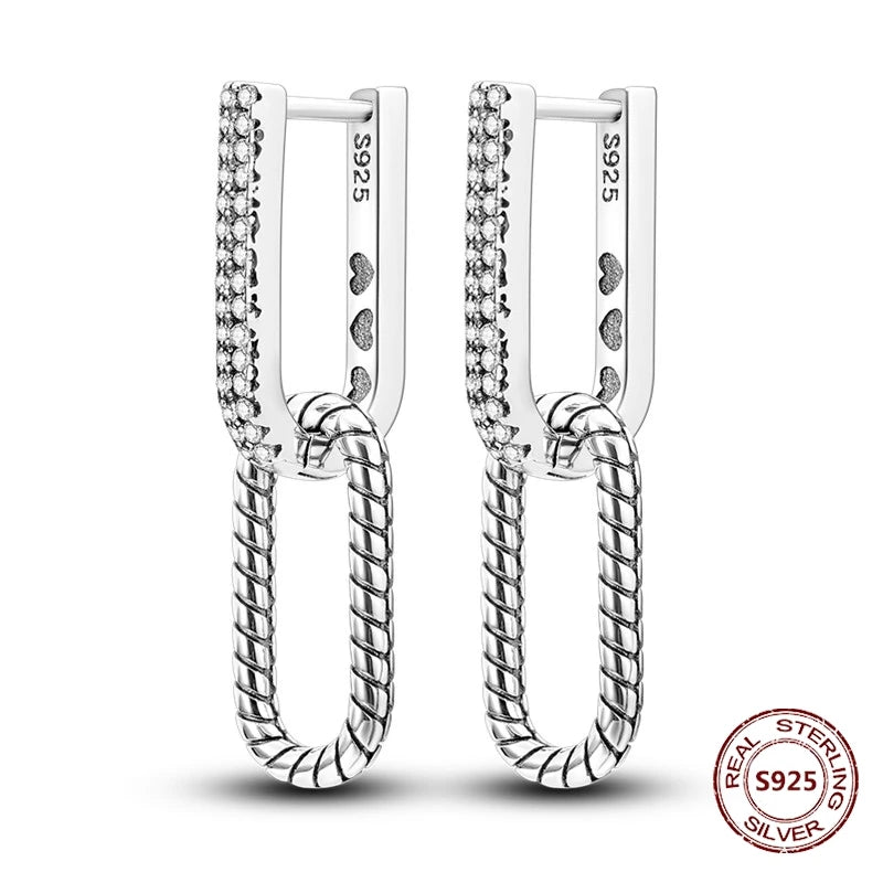 Zilveren oorbellen met lange ketting en geometrisch kruis design