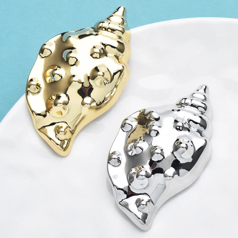 Broche schelp design – stijlvolle unisex roestvrijstalen accessoire voor elke gelegenheid
