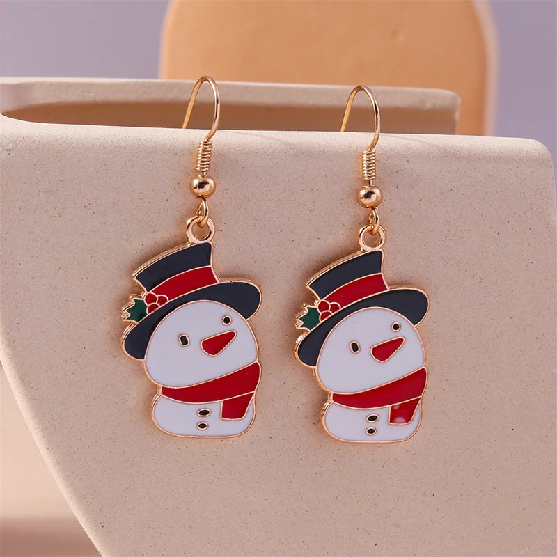 Kerst oorbellen met kerstman, rendier en sneeuwpop hangers