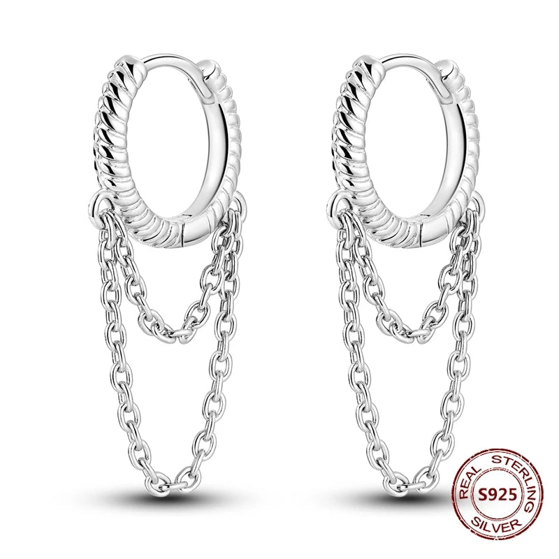 Zilveren oorbellen met lange ketting en geometrisch kruis design