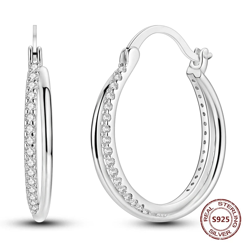 Zilveren oorbellen met vintage cirkel en witte zirconia