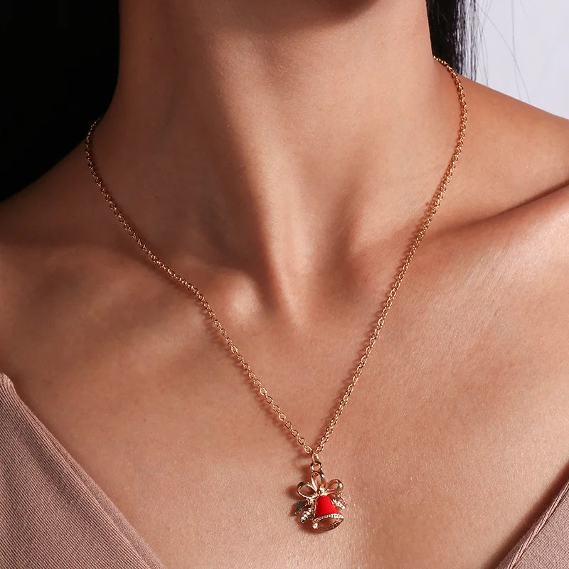 Kerst ketting met kerstboom, kerstman en belletjes hanger – feestelijke sieraden voor dames