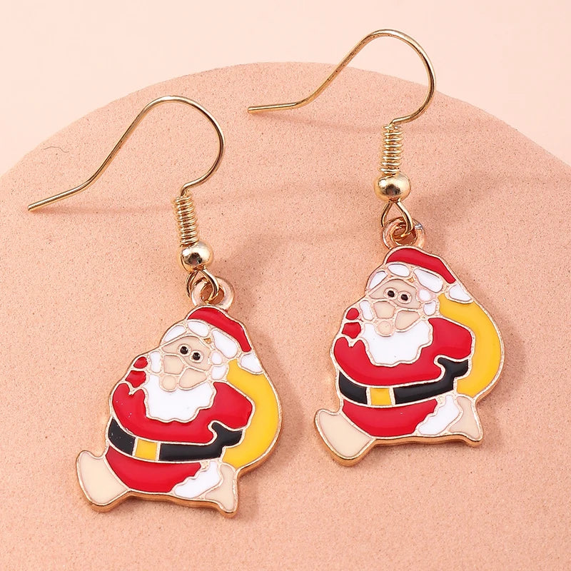 Kerst oorbellen met kerstman, rendier en sneeuwpop hangers