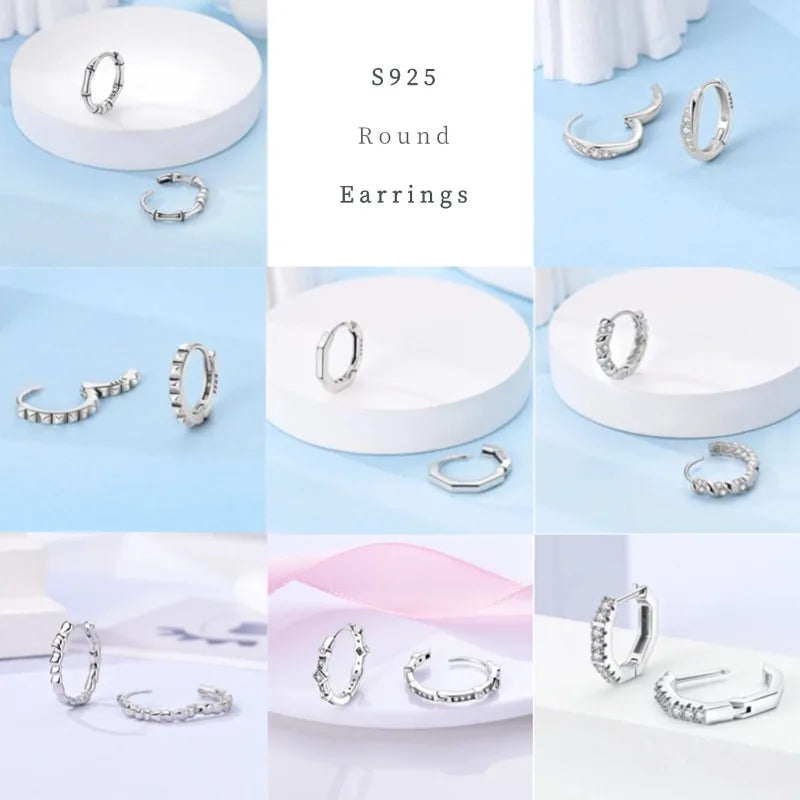 Zilveren oorbellen met vintage cirkel en witte zirconia
