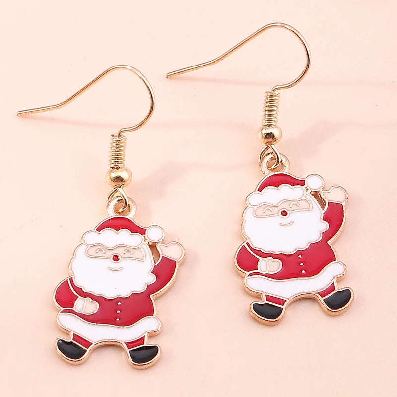 Kerst oorbellen met kerstman, rendier en sneeuwpop hangers