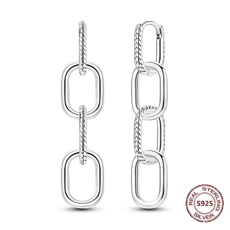 Zilveren oorbellen met lange ketting en geometrisch kruis design