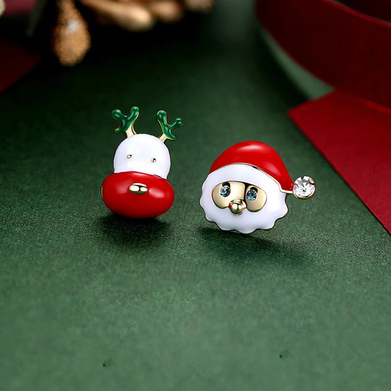 Kerst oorbellen groene strik met bel en rendier hanger – feestelijke damesoorbellen