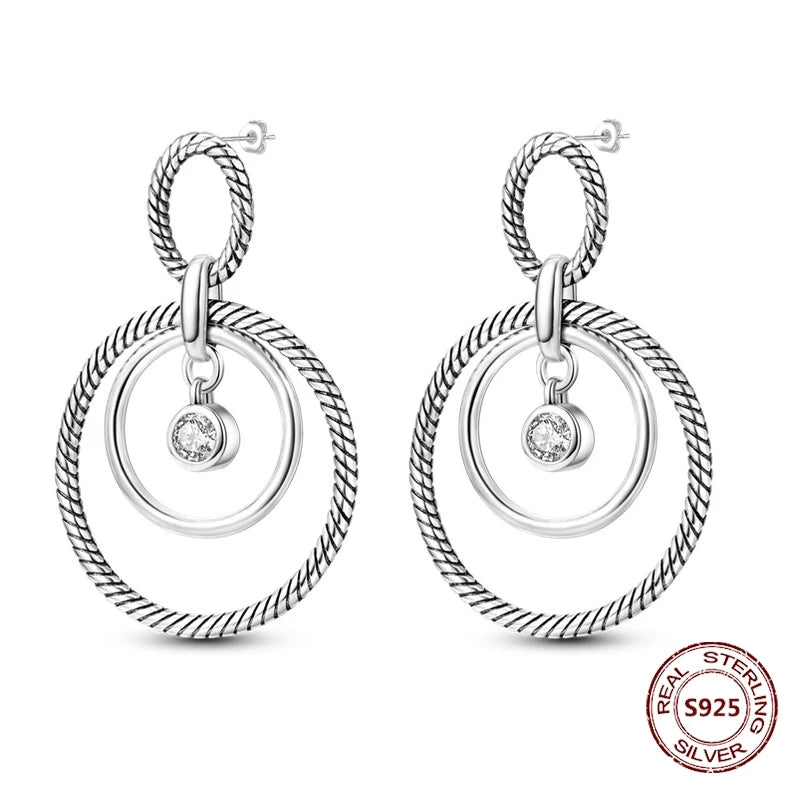 Zilveren oorbellen met vintage cirkel en witte zirconia