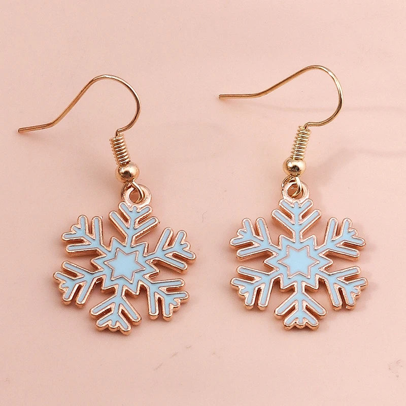Kerst oorbellen met kerstman, rendier en sneeuwpop hangers