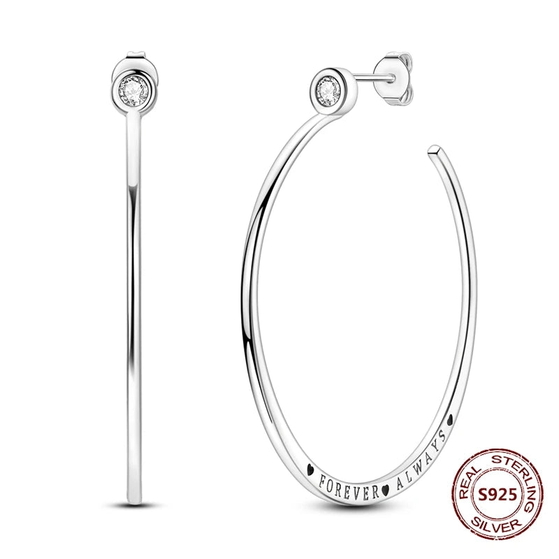 Zilveren oorbellen met vintage cirkel en witte zirconia