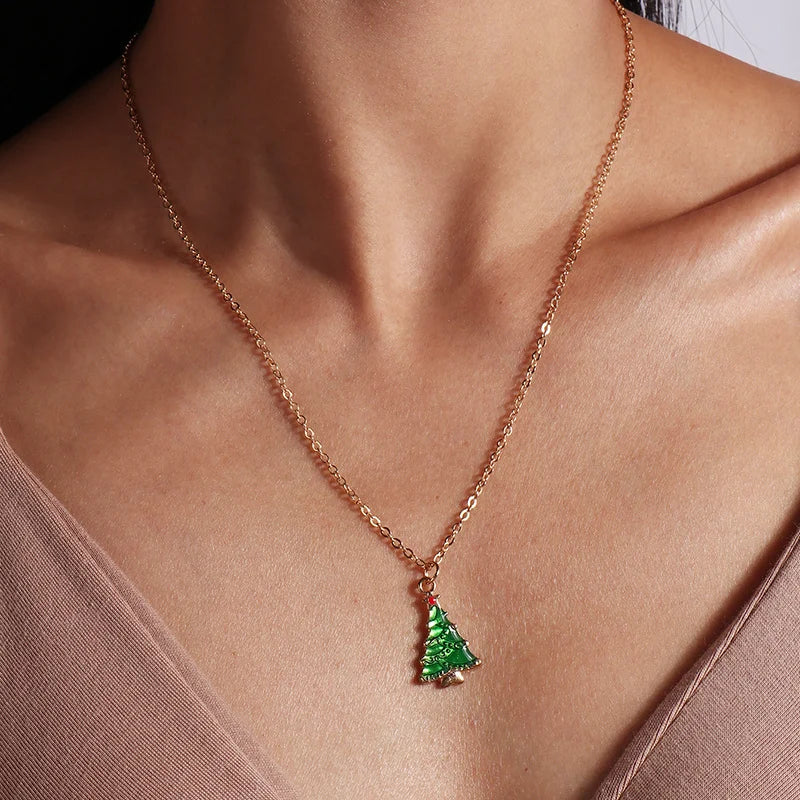 Kerst ketting met kerstboom, kerstman en belletjes hanger – feestelijke sieraden voor dames