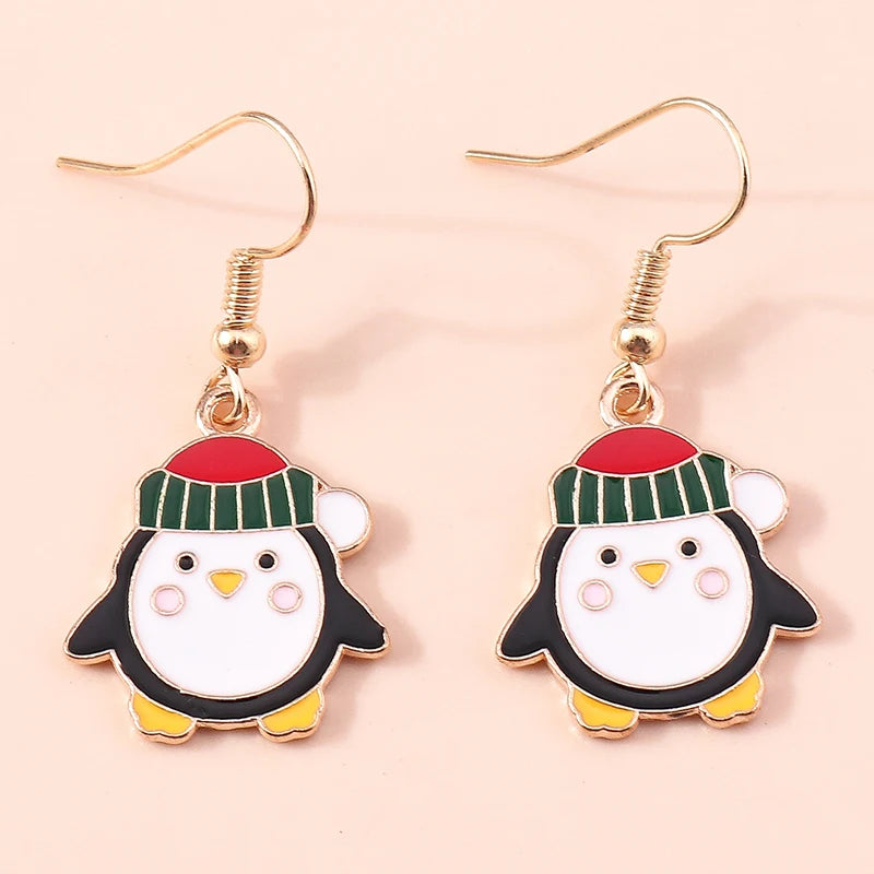 Kerst oorbellen met kerstman, rendier en sneeuwpop hangers