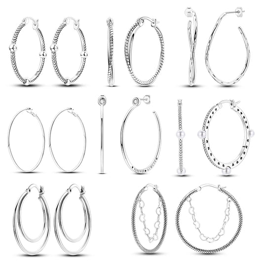 Zilveren oorbellen grote ronde hoops met zirkonia en vloeiend design