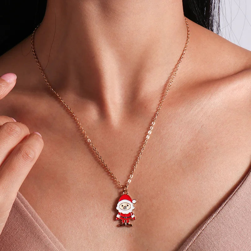 Kerst ketting met kerstboom, kerstman en belletjes hanger – feestelijke sieraden voor dames