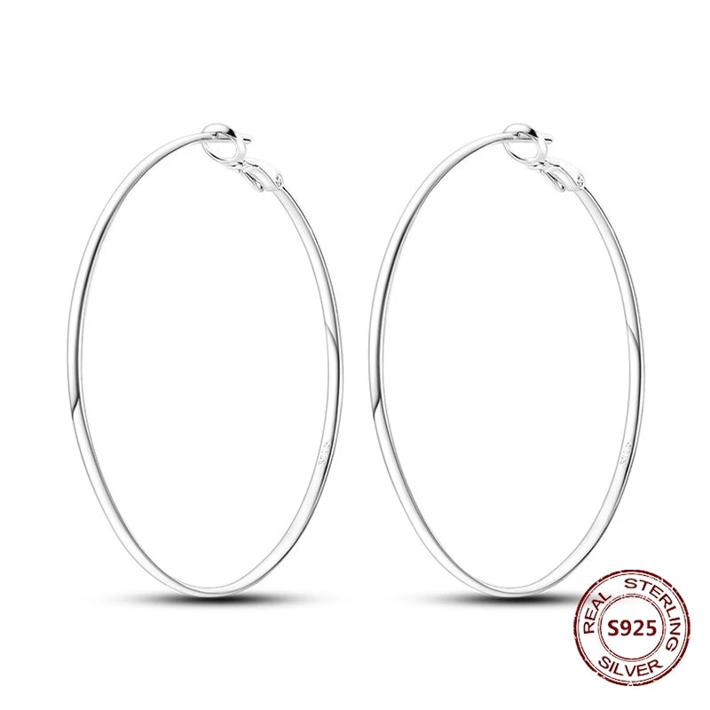 Zilveren oorbellen met vintage cirkel en witte zirconia