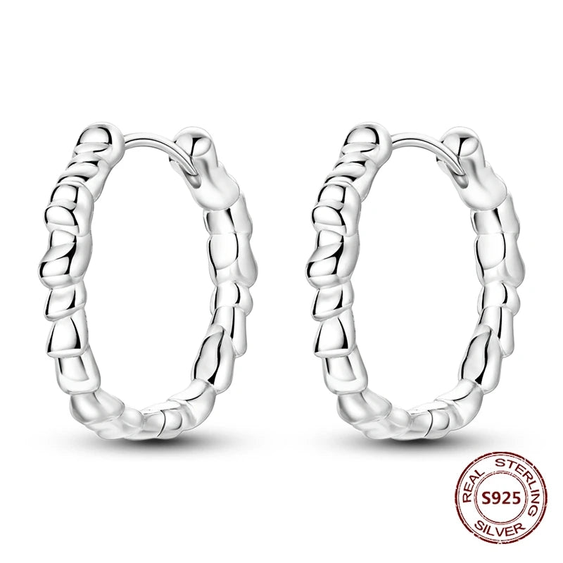 Zilveren oorbellen met vintage cirkel en witte zirconia