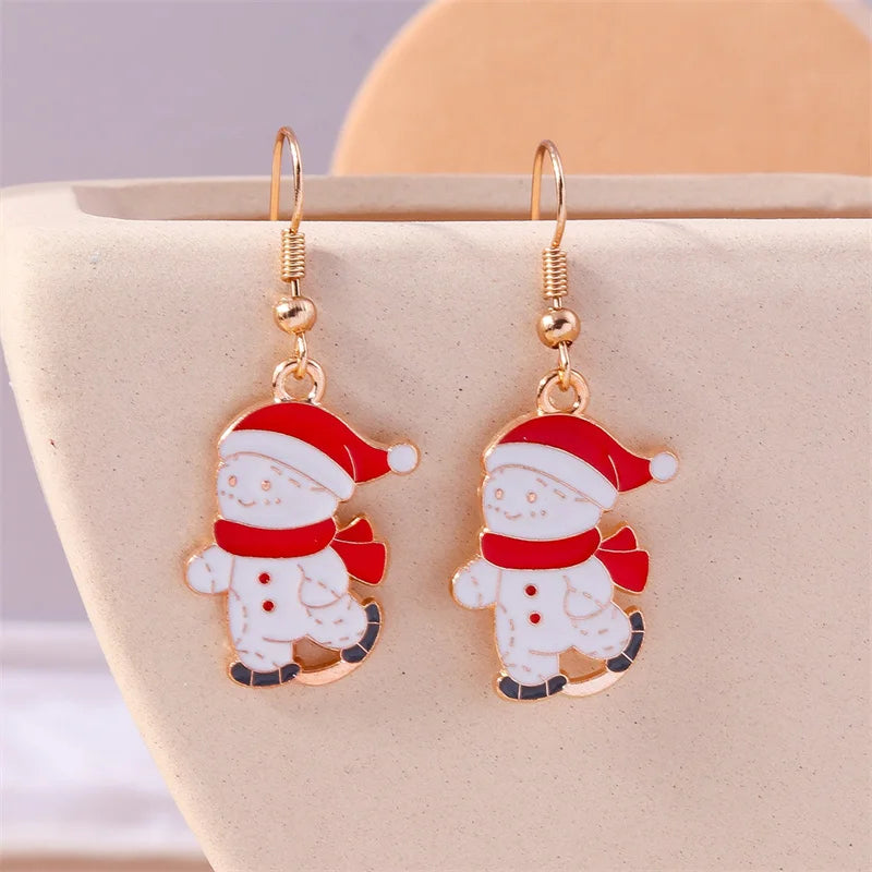 Kerst oorbellen met kerstman, rendier en sneeuwpop hangers