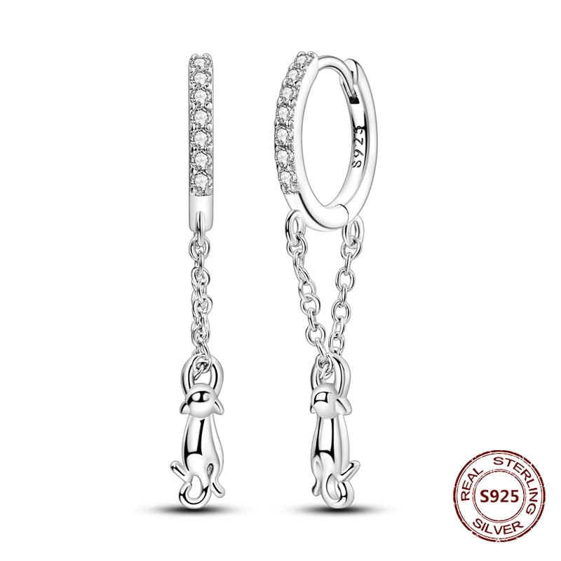 Zilveren oorbellen met lange ketting en geometrisch kruis design