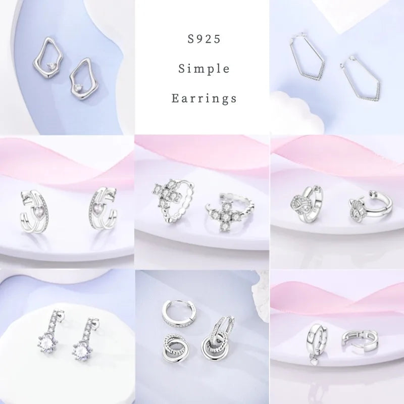 Zilveren oorbellen met lange ketting en geometrisch kruis design