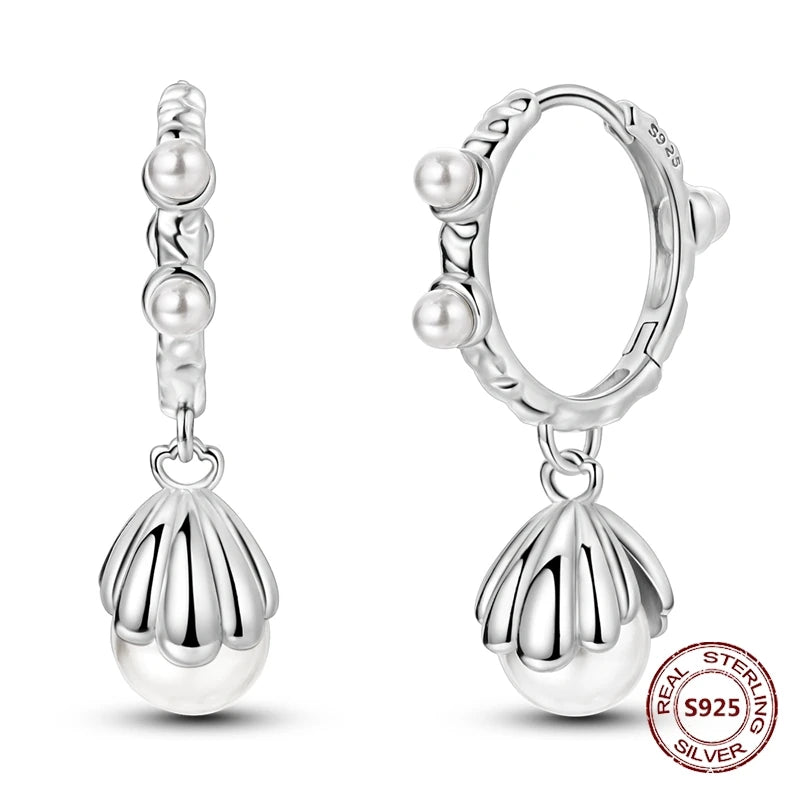 Zilveren oorbellen met lange ketting en geometrisch kruis design